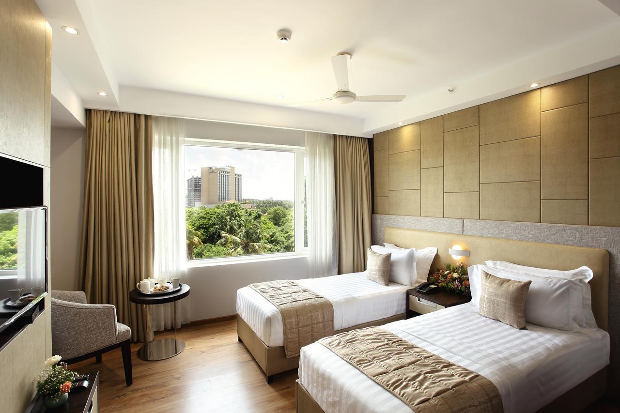 Sugar Business Hotel Kochi Exterior foto