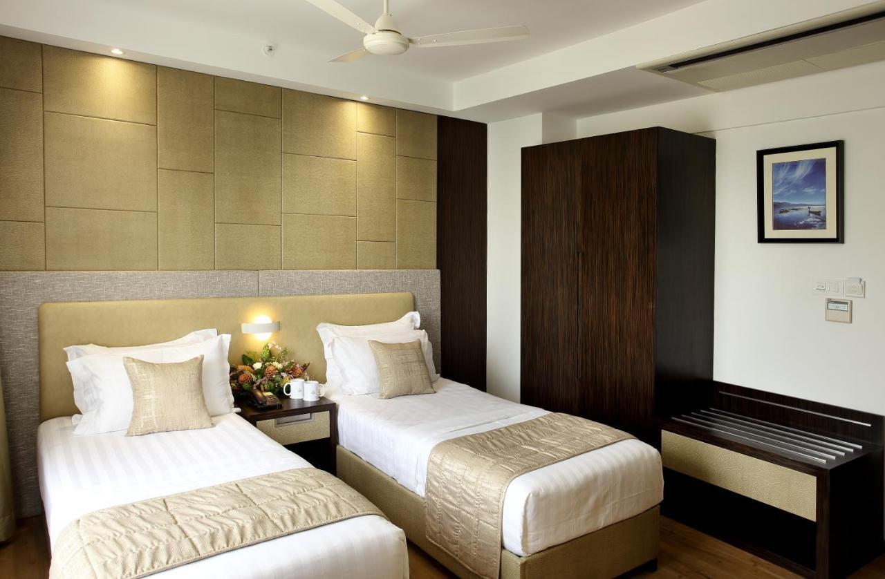 Sugar Business Hotel Kochi Exterior foto